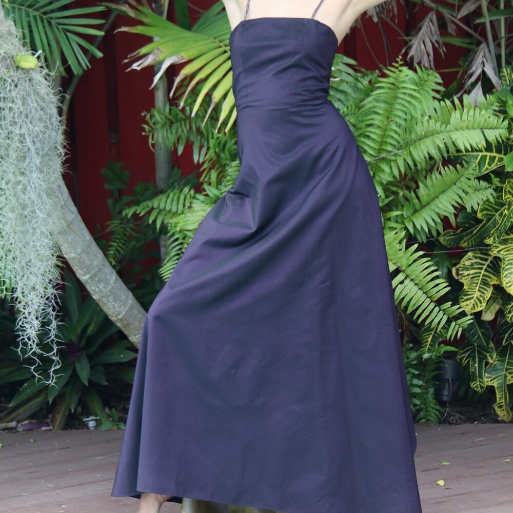 Long dress with back cut out and beaded straps. Long in front and short in back